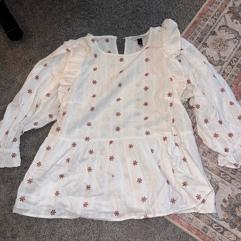 Embroidered peplum top